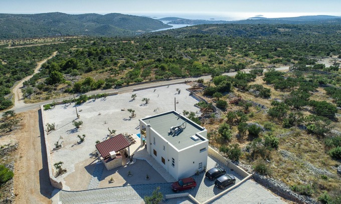 Rogoznica Villa | Exclusive villa for 8 people with heated pool & olive garden with a sea view