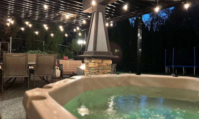 Walnut Grove House | Executive 2 bedroom suite with theater room, hot tub & large outdoor patio.