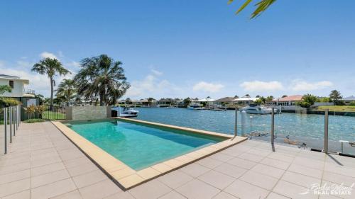 Banksia Beach House | Executive Canal Home