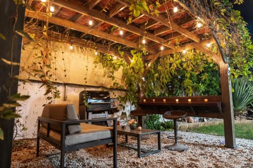 Bucana House | Expansive Paradise with Private Jacuzzi and Tropical Patio
