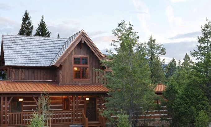 East Kootenay Cabin | Expansive porch with outdoor fireplace! Rec room inc pool and snooker tables
