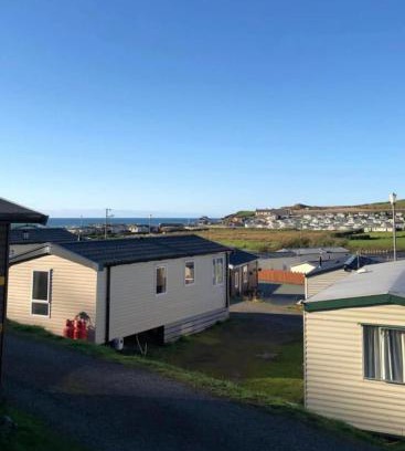 Aberystwyth House | Experience Coastal Bliss in Our Modern 2019 Sea Viev 2 Bedroom static caravan at Clarach Bay Holiday Village!