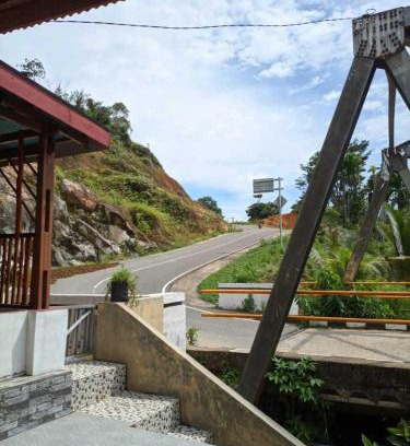Painan Hotel | EXPRESS O 91702 Mandeh Homestay Syariah Near Bank Nagari PT Bank Pembangunan Daerah (BPD) Sumbar Cabang Painan