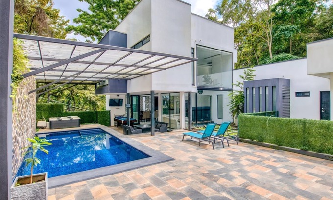 Escazu House | Exquisite 7-Bedroom Mansion in Escazú featuring Heated Pool, Jacuzzi, & Full AC.