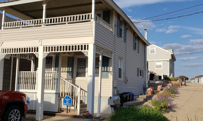 Manasquan House | Fabulous beach cottage steps to the most desirable Riddle Way beach Manasquan!