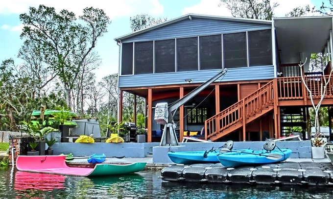 Weeki Wachee Gardens House | Family-Friendly Riverfront Home w/Game Room, Kayaks, Swim Mat & Space to Play