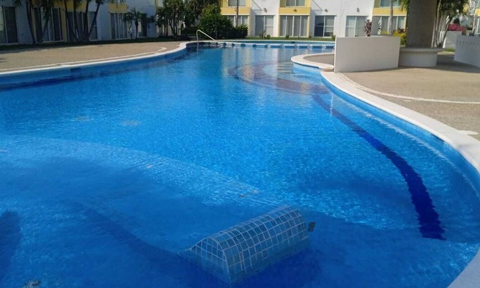 Diamante House | Family house, close to the beach, stores and the airport.