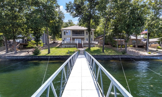 Sunrise Beach House | Family Lakefront Home with Large Private Dock with Boat Slip