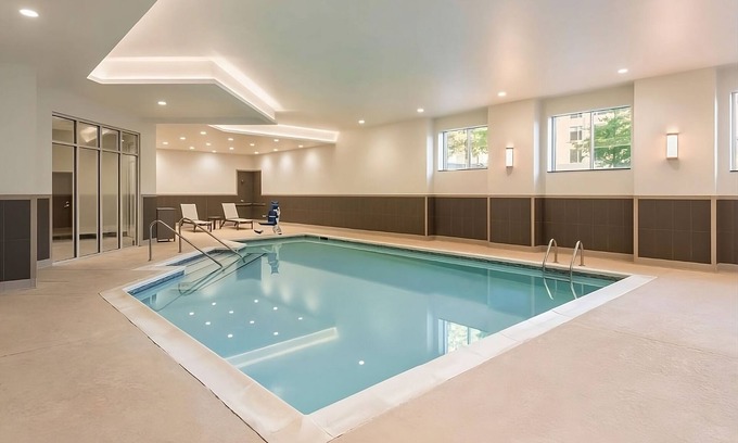 Greenville Downtown Apartment | Family Retreat w/Queen Beds, Indoor Pool Access, Near Peace Center & Museums