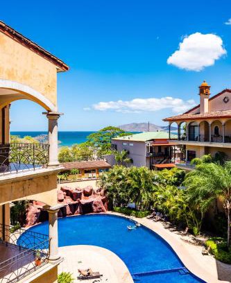 Tamarindo Apartment | Family Setting, Big Pool Beach Facing In Towns