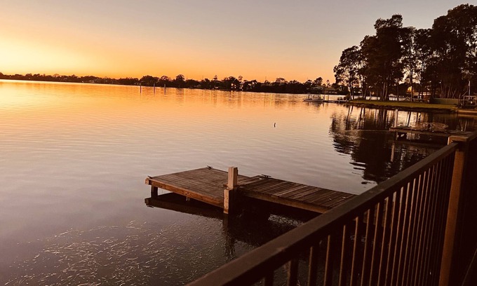 Gorokan House | Family-sized Waterfront Home with lake views & private jetty!