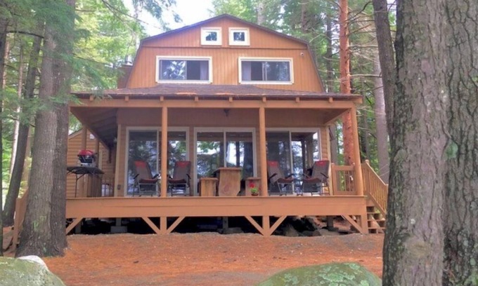 Belgrade House | Famous cottage directly on 100' private shoreline of pristine lake.