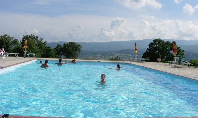 Poppi Apartment | Farmhouse in Tuscany with Pool & Valley Views