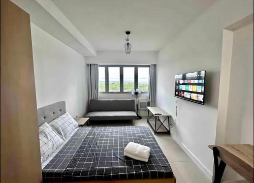 Matandang Balara Apartment | Fast WiFi - Free Pool Access - Netflix - Hot Shower