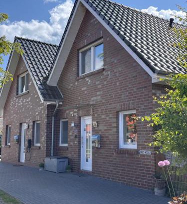 Dornum House | Feriendomizil Dornum Haus Willy mit Wintergarten und Wallbox