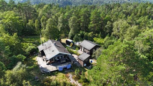 Lyngdal House | Ferienhäuschen mit Sonne und Seeblick