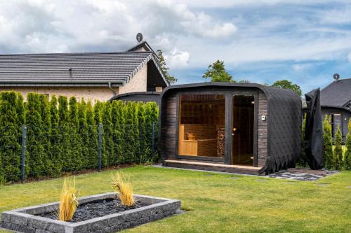 Barssel House | Ferienhaus am See mit Sauna