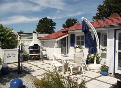 Onderdijk House | Ferienhaus De Graaf mit einer sonnigen Terrasse und Garten IJsselmeer