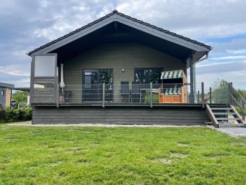Sehestedt House | Ferienhaus Haus Seehund direkt hinterm Deich an der Nordsee