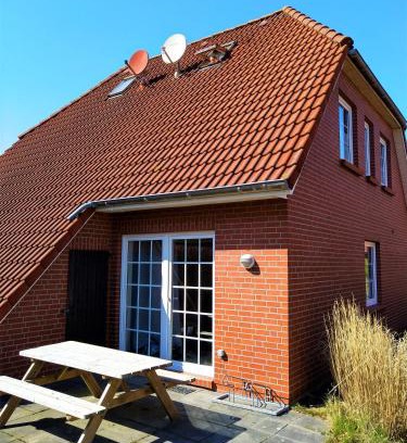 Neßmersiel House | Ferienhaus Kolibri, exklusiv und familiär in Neßmersiel mit Anbindung nach Baltrum