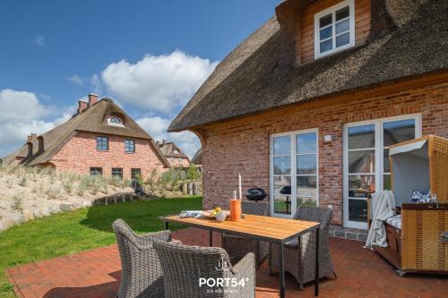 Ellenberg House | Ferienhaus Reetlodge auf den Schleiterrassen Kappeln