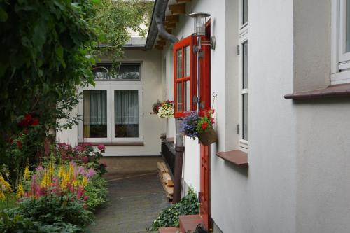 Warnemuende Apartment | Ferienwohnung Hofidyll - Warnemünde