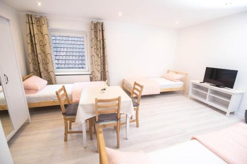 Roemerberg House | Ferienwohnung und Zimmer Römerberg-Speyer