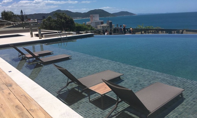Ingleses Sul Apartment | Fit new design - play area with infinity pool and spectacular view