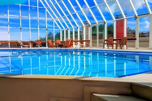 Parque Ferradura Apartment | Flat c/Piscina Aquecida, Hidro e vista da Serra