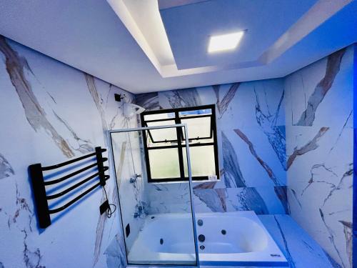 Sao Vicente Apartment | Flat -Hidromassagem privativa e Piscina a 500 mts da praia