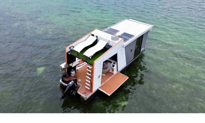 Sarasota Boat Rental | Floating Oasis (Modern Houseboat with rooftop patio)