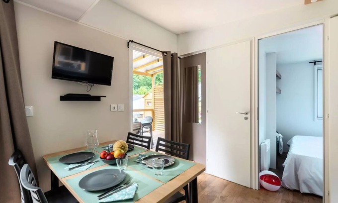 Yport House | Flower Camping La Chênaie * - Homeflower Premium 35m2 (3 bedrooms) + CLIM + semi-covered terrace + TV + sheets + towels 6 people