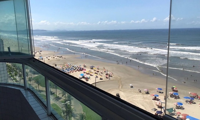 Caicara Apartment | Foot in the sand with barbecue on the balcony facing the sea, children welcome