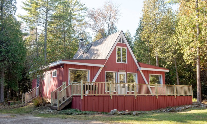 Sturgeon Bay House | Forest A-frame with fireplace