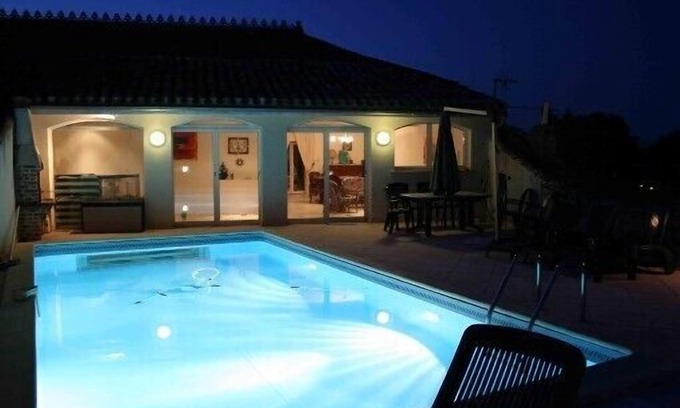 Roquecor House | Former grocery store with pool on the roof (transparent side)