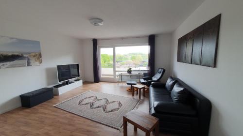 Flensburg Apartment | FORUZ - Apartment mit Balkon & TG-Stellplatz