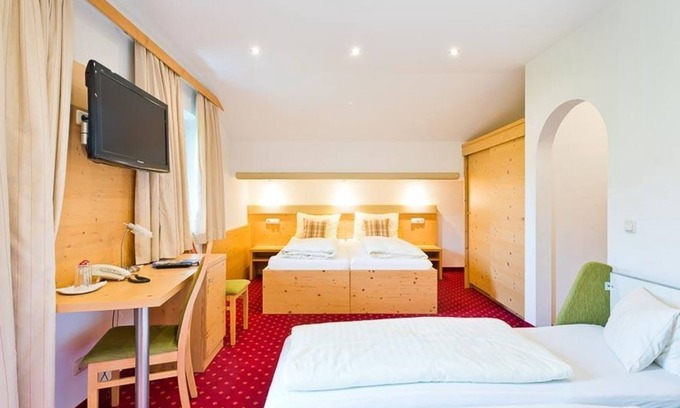 Maria Alm am Steinernen Meer House | Four-bed room, shower, WC, garden side - Hotel Sportalm Hintermoos