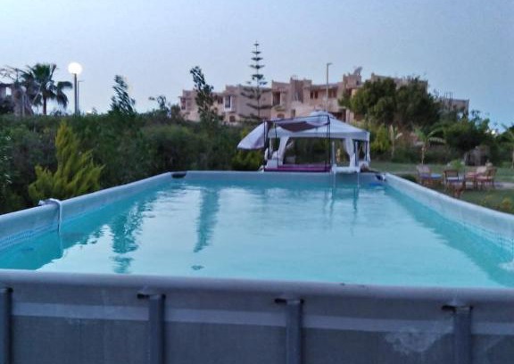 Marina El Alamein Ski Chalet | Four Bedroom Chalet at Marina 4 Private Pool and Garden