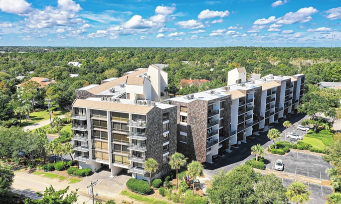 North Litchfield Beach Condo | Fourth Floor Condo Across from Beach Access, Balcony, Pool, Grill Area, Elevator