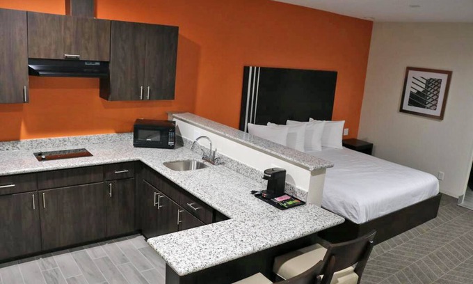 Humble Hotel | Free IAH Shuttle and Breakfast - Stay Comfortably with In-Room Kitchenette