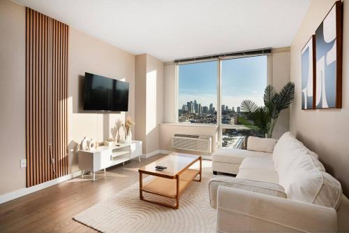 Hoboken Apartment | Freedom Tower View -Amenity Packed -minutes to NYC