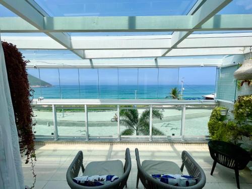 Recreio dos Bandeirantes Apartment | Frente mar- Apto pé na areia com charme e conforto