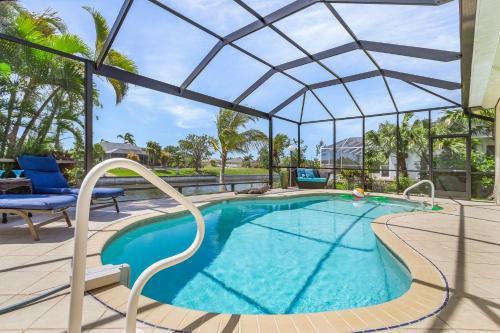 Trafalgar House | Freshwater Canal, Bicycles, Heated Pool - Casamigos - Roelens Vacations