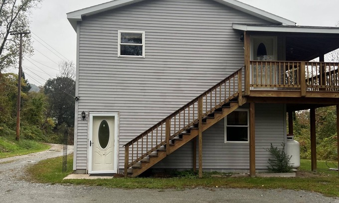 North Pownal House | Full two story home with wrap around deck and fire pit!