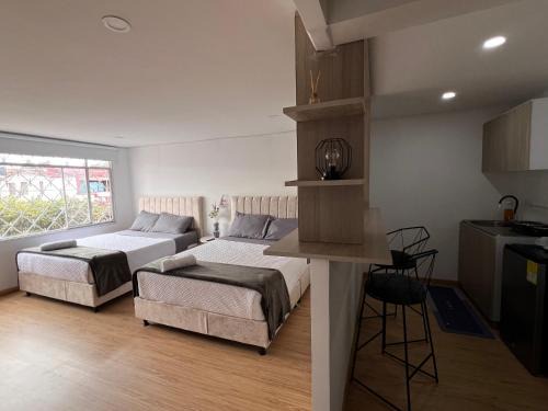 Calle 26 Apartment | Garden's Aparta hotel