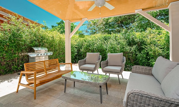 Villarreal Condo | Gated resort condo with on-site pool, outdoor areas, private patio, & W/D