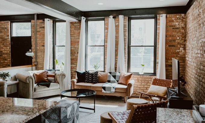West Lakeview Condo | Gather Together & WFH in Piece of Chicago History