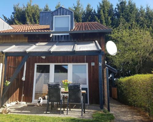 Zandt House | Gemütliches Ferienhaus mit Kamin und eigenem Garten in bayerischem Feriendorf