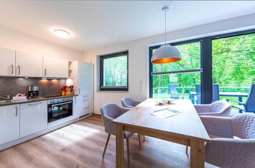 Krakow am See Apartment | Glücksraum - Modernes Apartment mit Panoramablick, Kamin & Wohlfühlambiente