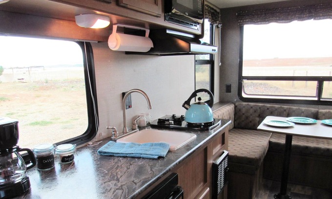 Lewis House | Glamper - Camper set up in a campground or on our property
